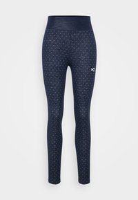 Marineblå sømløse leggings med små hvite hjerte mønstre, høy midjebånd, og hvit logo på øvre lår, frontansikt på hvit bakgrunn.