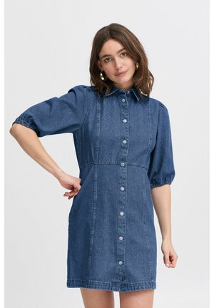 Denim dress with short puff sleeves, button-down front, and a fitted waist. Features blue color and slightly frayed hem.