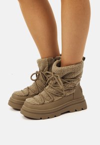 mtng Snowboot/Winterstiefel - marron