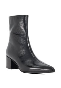 Black leather ankle boots with a pointed toe, shiny texture, and a block heel. The design features a sleek silhouette and minimal detailing.