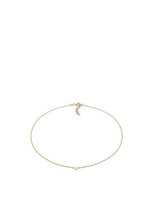 Collier délicat en chaîne d'or avec un petit pendentif en forme de cœur et un fermoir ajustable sur fond blanc.