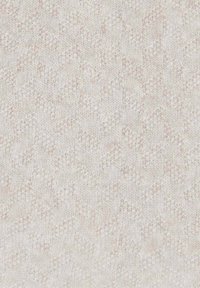 Tessuto di maglione color crema chiaro con un delicato motivo a zigzag, texture morbida e fibre miste, che crea un aspetto accogliente e caldo.