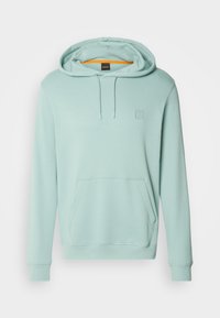 Sweat à capuche vert clair avec poche avant et cordons, avec un petit logo embossé sur la poitrine et une doublure intérieure orange de la capuche.