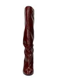 Knee-high, glossy burgundy leather boot with a pointed toe, slouchy design, and a high stiletto heel, featuring a smooth, shiny texture.