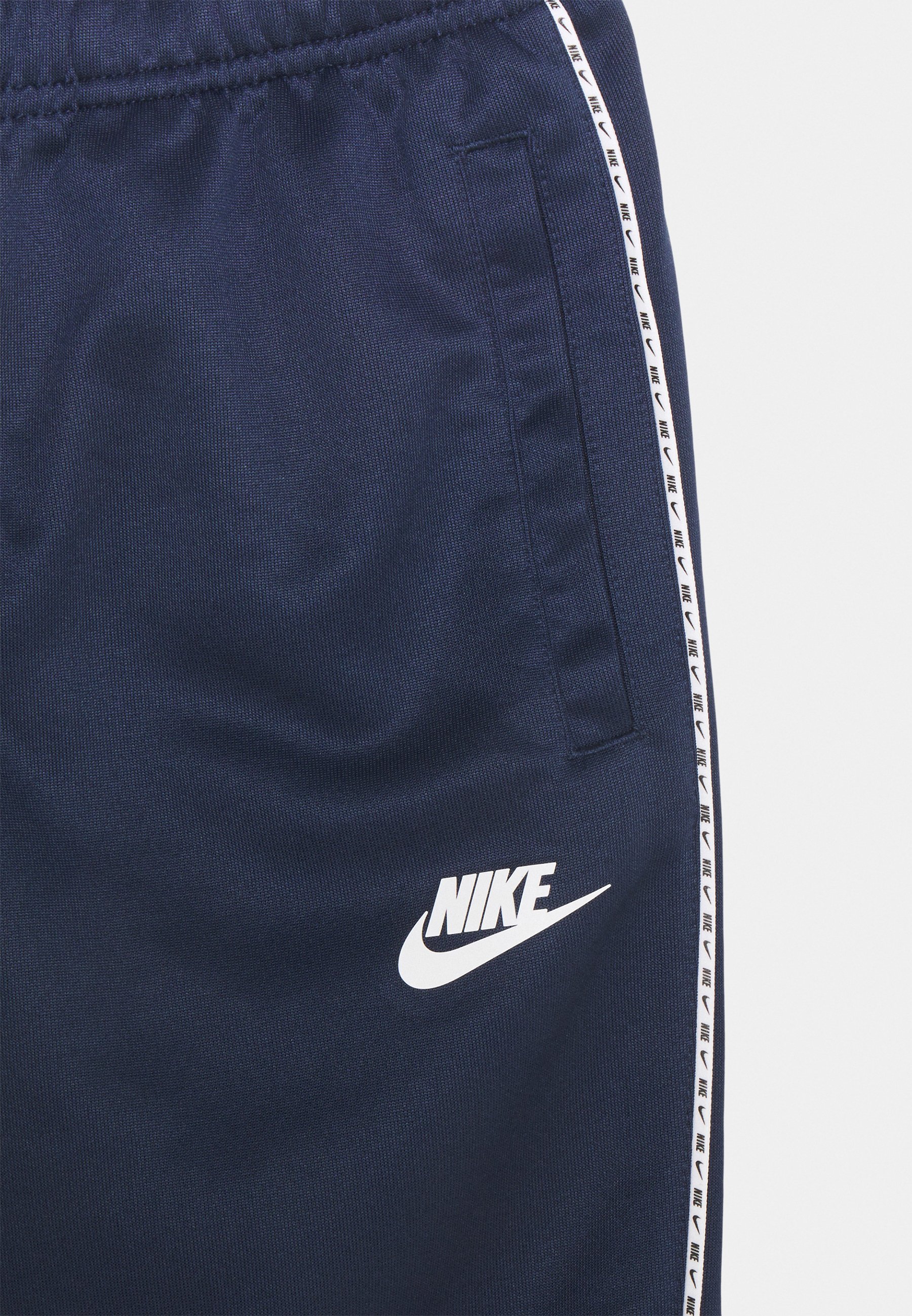 nike repeat tape poly pant