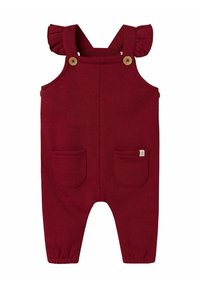 Roter gestrickter Overall mit Rüschenträgern, Holzknöpfen, zwei Vordertaschen und elastischen Bündchen an den Knöcheln. Weicher, strapazierfähiger Stoff.