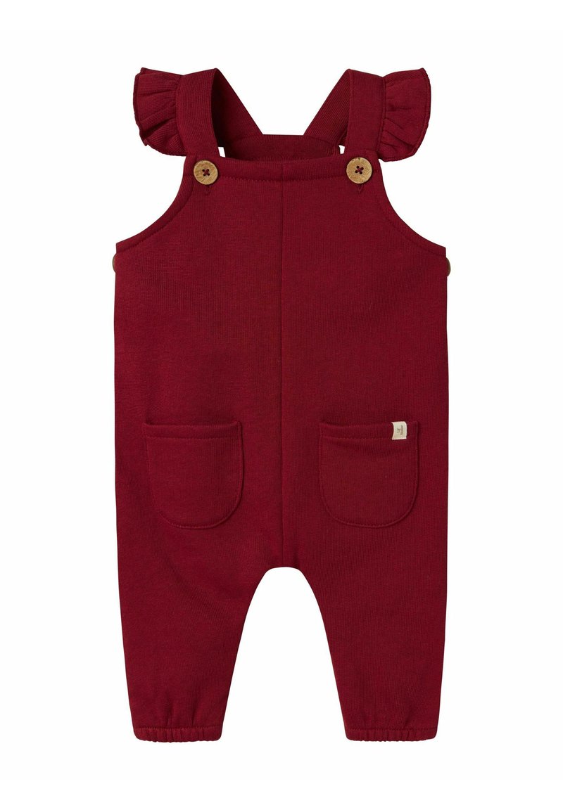 Roter gestrickter Overall mit Rüschenträgern, Holzknöpfen, zwei Vordertaschen und elastischen Bündchen an den Knöcheln. Weicher, strapazierfähiger Stoff.