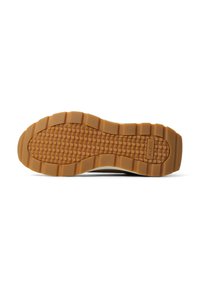 Suela de zapato de goma con un patrón texturizado de cuadrados elevados, predominantemente marrón con un borde crema ligeramente más claro.