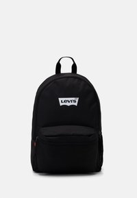 Black fabric backpack with a rounded shape, featuring a front zipper pocket and a white Levi's logo on the front. Top carrying handle included.