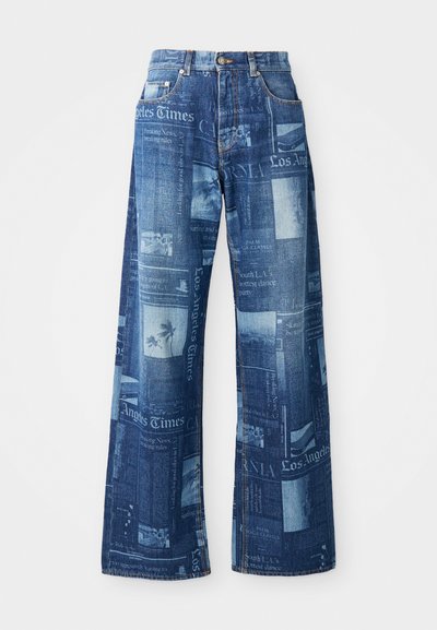 Denim wide-leg jeans featuring a newspaper print in shades of blue, with front pockets and a button closure at the waistband.