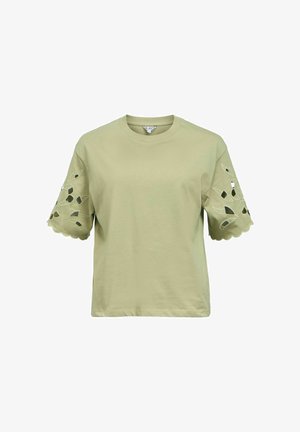 Lysegrøn kortærmet skjorte med bølget kant og udskårede blomster mønstre på ærmerne, rund halsudskæring, afslappet pasform.