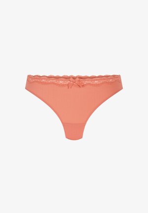 Perzikkleurige string gemaakt van ribbelstof, met een elastische kanten afwerking en een klein strikdetail aan de voorkant.