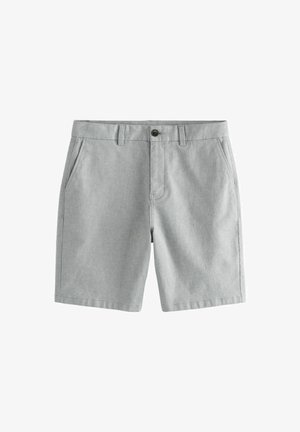 Pelēki šorti, kas izgatavoti no austiem audumiem, ar divām sānu kabatām un pogu aizdari. Dizains ir vienkāršs ar taisnu griezumu.