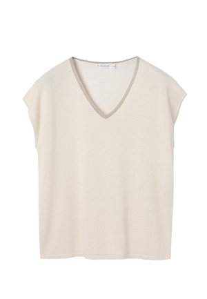 V-hals, kortærmet top i lys beige med en subtil glans. Halsudskæringen har en kontrasterende sølvkant. Blødt, tekstureret stof.