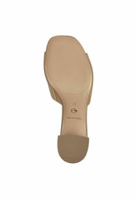Semelle de chaussure à talon haut beige avec une surface lisse, un bout rond et un motif de traction texturé. Présente une empreinte de logo et un marquage de taille.