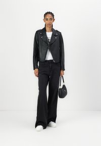 COACH MOTO JACKET - Lederjacke - black