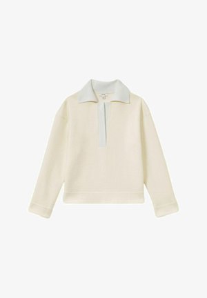 Pulover v kremni barvi z kontrastnim svetlo modrim ovratnikom in zapenjanjem. Ima dolge rokave in raven rob. Mehka tekstura.