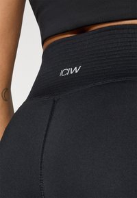 ICANIWILL DEFINE SEAMLESS FLARED - Tights - black