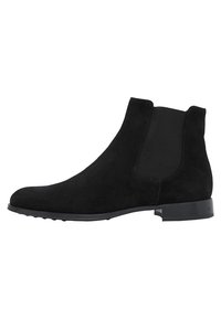 Schwarze Wildleder-Ankle-Boots mit elastischen seitlichen Einsätzen, abgerundeter Zehenpartie und einem niedrigen Blockabsatz. Glatte Textur mit minimalistischem Design.