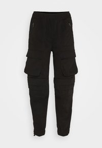 Černé pracovní kalhoty s elastickým pasem, zipovými kapsami a řasenými detaily na nohavicích. Vyrobené z odolné látky s hladkou texturou.