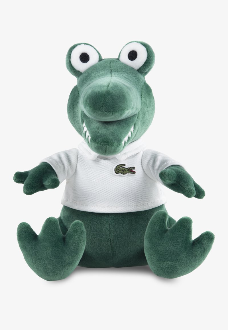 Πράσινο μαλακό παιχνίδι κροκόδειλος που φοράει λευκό πουκάμισο, με μεγάλα κινητά μάτια, υφασμένο σώμα και λεπτομερή κεντητή διακόσμηση.