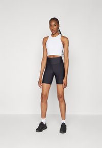 Athleta INTERVAL STASH SHORT - Leggingek - black