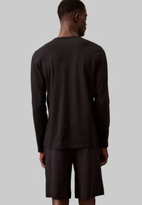 Calvin Klein Underwear LOGO - Pyjamasoverdel - black