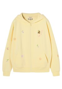 Lys gul hættejakke med lynlås, der har små pastelfarvede blomster, en bi-grafik og teksten "let it bee" på forsiden til højre.