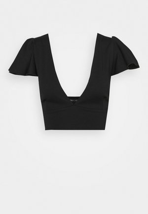 Sort cropped top med dyb V-hals og korte puffede ærmer, vist på en ensfarvet lys baggrund.