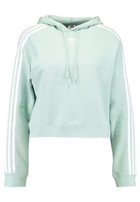 Vaaleanvihreä lyhyt huppari pehmeästä materiaalista, jossa on kiristysnauhalla varustettu huppu ja kolme valkoista raitaa hihoissa. Klassinen logo rinnassa.