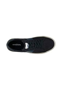 Black suede sneaker with navy leather accents, round toe, fabric laces, and beige rubber sole. "wojas" logo visible on the insole.