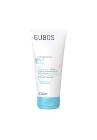 EUBOS lotion tube with a white body and a blue cap. Features pink flower graphic and blue text. Designed for dry children's skin relief.