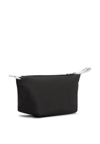 Μαύρο υφασμάτινο πουγκί με ορθογώνιο σχήμα, κλείσιμο με φερμουάρ και λευκή ταινία τραβήγματος. Ομαλή υφή, μινιμαλιστικός σχεδιασμός χωρίς ορατά σχέδια.