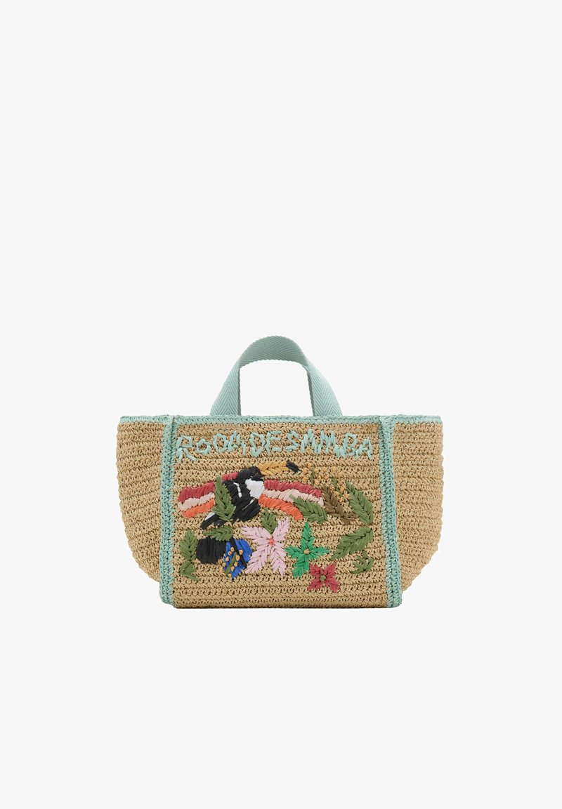 Sac fourre-tout en paille tressée avec poignées turquoise, broderie florale, feuilles vertes et détail texte sur le panneau avant.