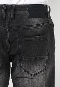 Koroshi STRETCH  - Džinsi ar taisnām starām - black