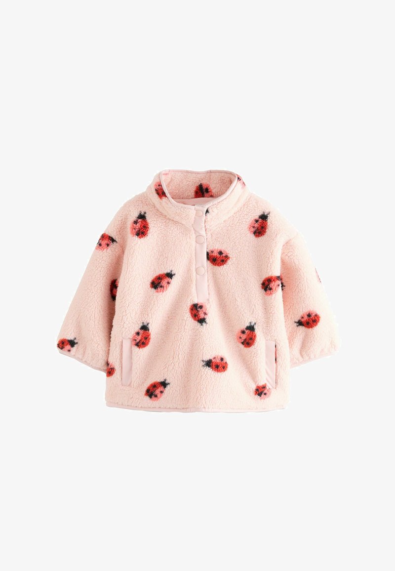 Pulover din fleece roz cu model de buburuze. Are un guler înalt, nasturi tip snap și buzunare laterale. Material moale, texturat.