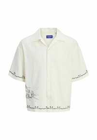 Kortärmad, kragad skjorta i off-white tyg med en grå skissdesign och dekorativt trim längs fållen. Knäppning fram.