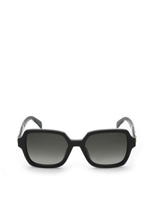 Lunettes de soleil rectangulaires noires avec montures épaisses et verres foncés dégradés sur fond blanc.