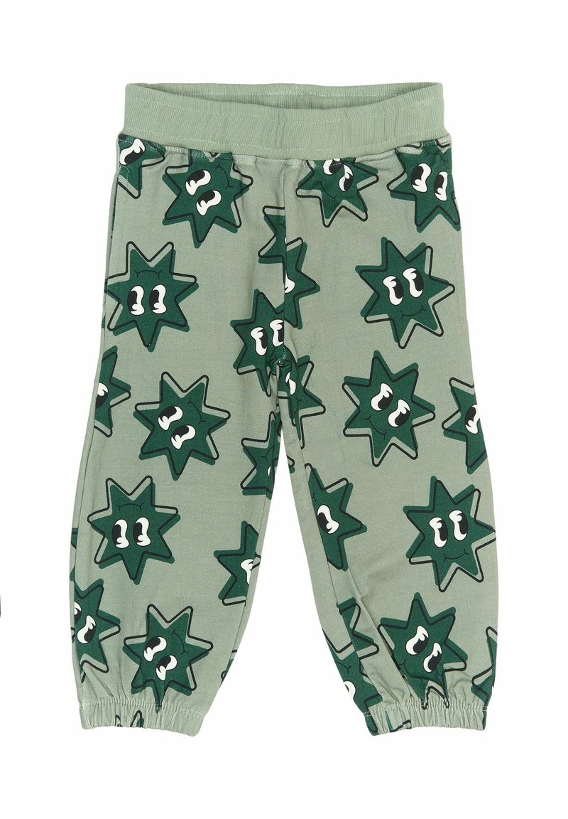 Pantaloni jogger din bumbac verde, cu modele în formă de stea și ochi. Au un brâu elastic și manșete strânse la gleznă.