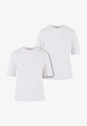 Two white short-sleeve t-shirts made of cotton, featuring round necklines and a simple, smooth texture without patterns or accents.