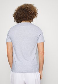 Lacoste Sport BIG LOGO - T-shirt desportiva - silver chine/white