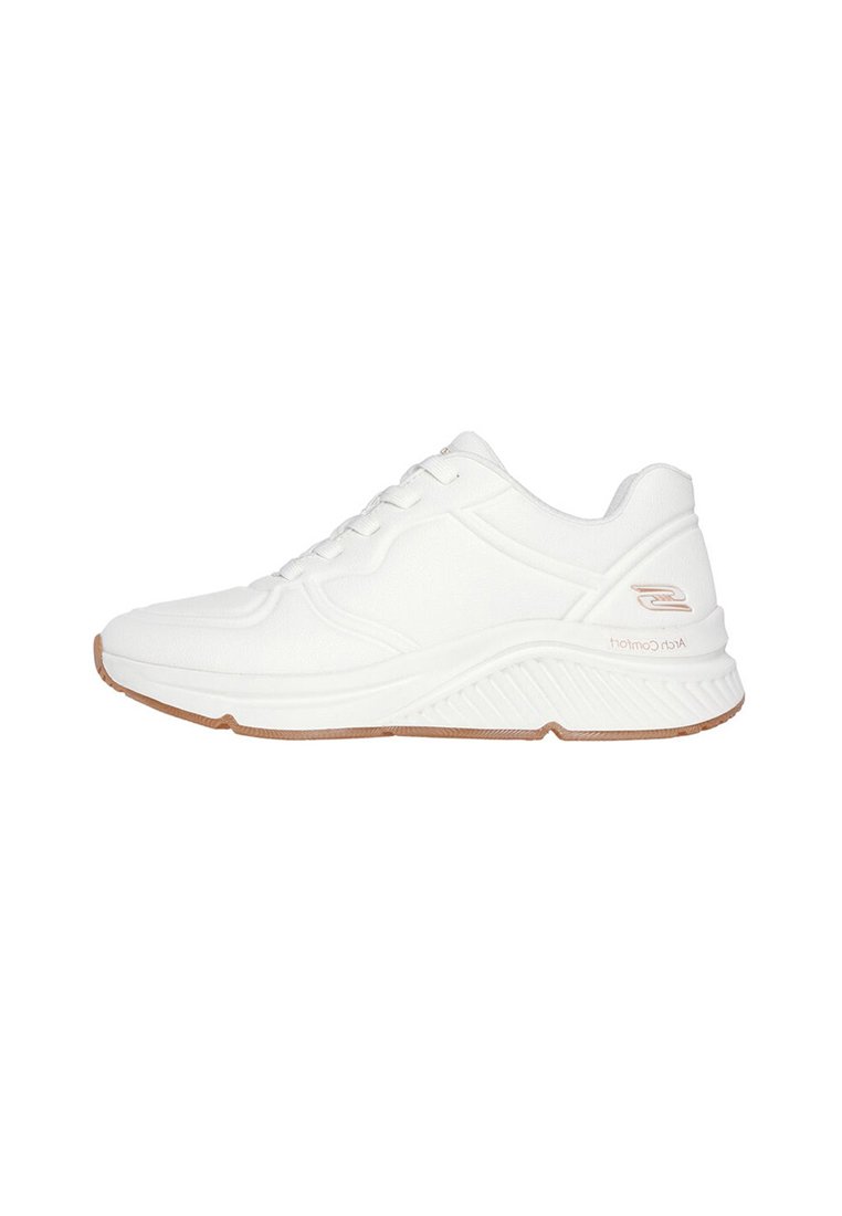 White athletic shoes with a textured upper, lace-up front, and gum rubber outsole; features subtle design accents and cushioning.