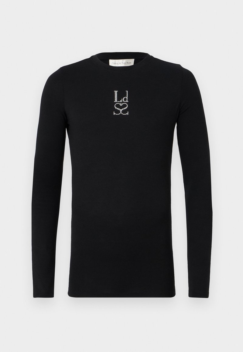 Svart långärmad t-shirt av mjukt tyg med en kristallbeströdd logotypdesign i mitten fram.