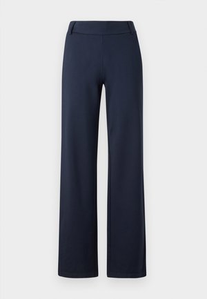 Pantalons amples bleu marine en matériau doux et extensible. Dotés d'une taille plate et d'une texture lisse ; sans motifs ni détails métalliques visibles.