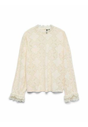 Blonder langærmet top i creme med intrikate blomster mønstre, bølget halsudskæring og manchetter. Blød tekstur, afslappet pasform, detaljeret blonder trim.