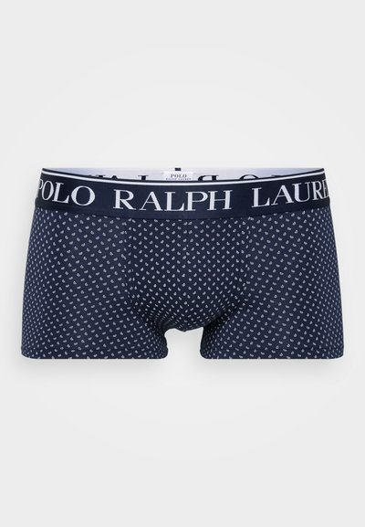 Boxer briefs azul-marinho com um padrão branco, apresentando uma cintura elástica preta com o nome da marca "Polo Ralph Lauren". Tecido de textura suave.