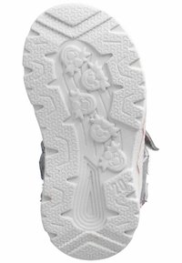 Suela de zapato de goma blanca con un patrón de agarre texturizado, que presenta acentos en forma de estrella y un diseño de banda de rodadura en zigzag.