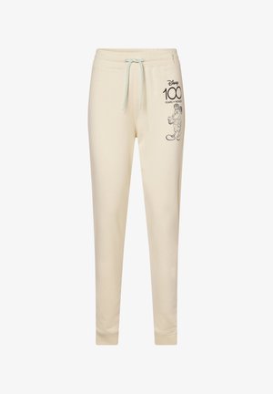 Pantalones de chándal color crema hechos de una tela suave, con cintura ajustable con cordón y un diseño impreso de Mickey Mouse con el texto "Disney 100".