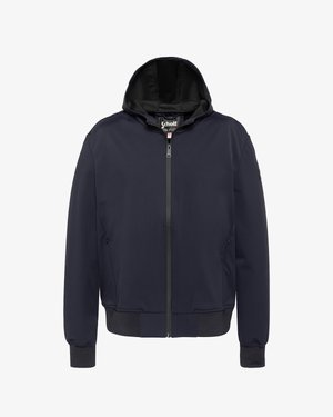 Veste à capuche bleu marine avec fermeture éclair frontale, poignets et ceinture côtelés, et poches latérales zippées.