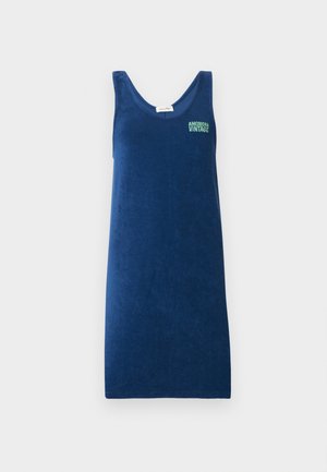 Robe bleu marine en éponge sans manches, longueur genou, avec encolure dégagée et petit logo "American Vintage" sur la partie supérieure gauche de la poitrine.